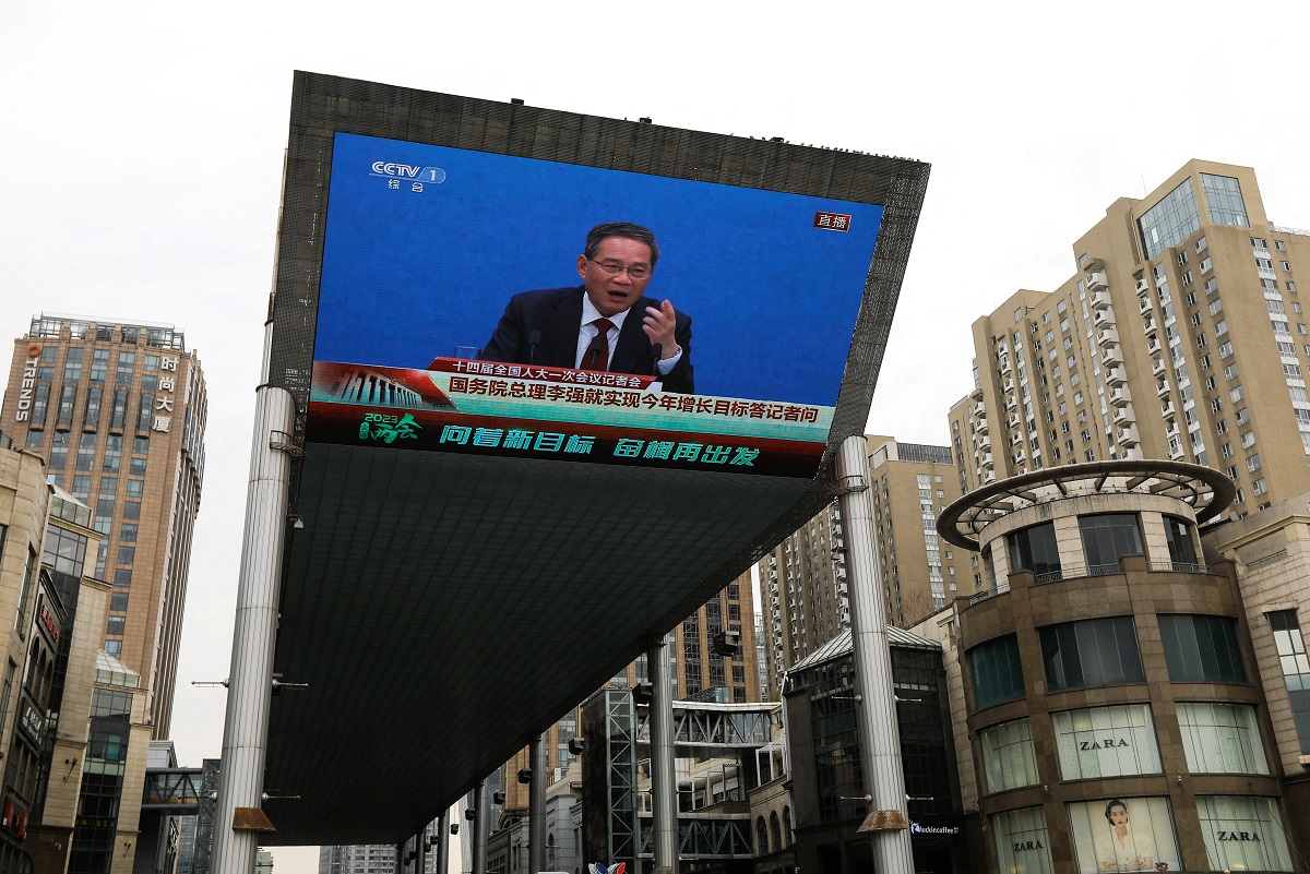 A giant screen displays a live broadcast of Chinese premier Li Qiang speaking at a news conference following the closing session of the National People's Congress in Beijing March 13, 2023. (Reuters pic)